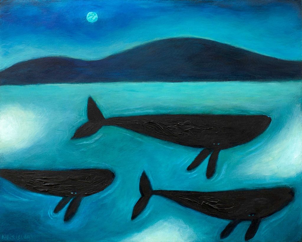 Whales coasting along at night in the blue moon light.